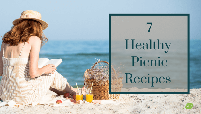 woman having a healthy picnic on the beach